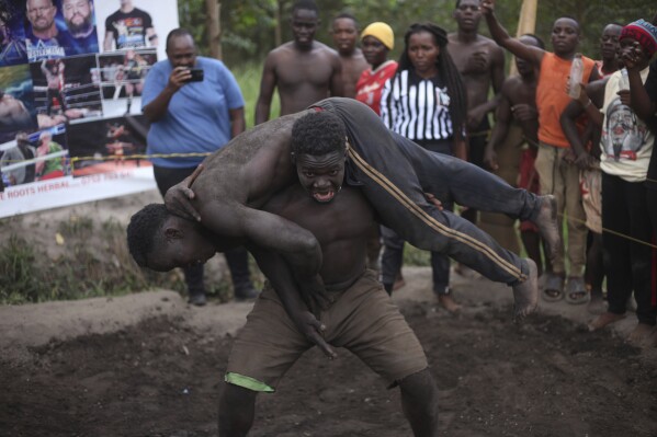 Mud wrestling in Uganda